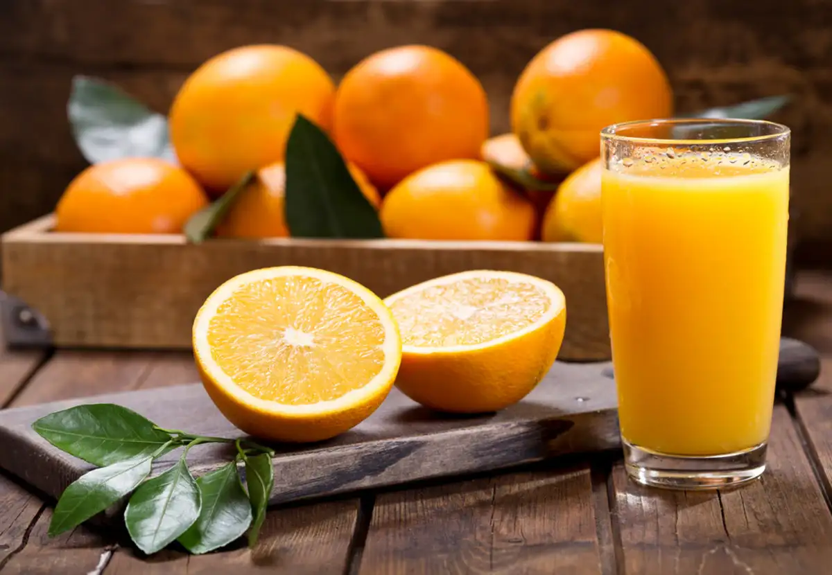 oranges and glass of orange-juice