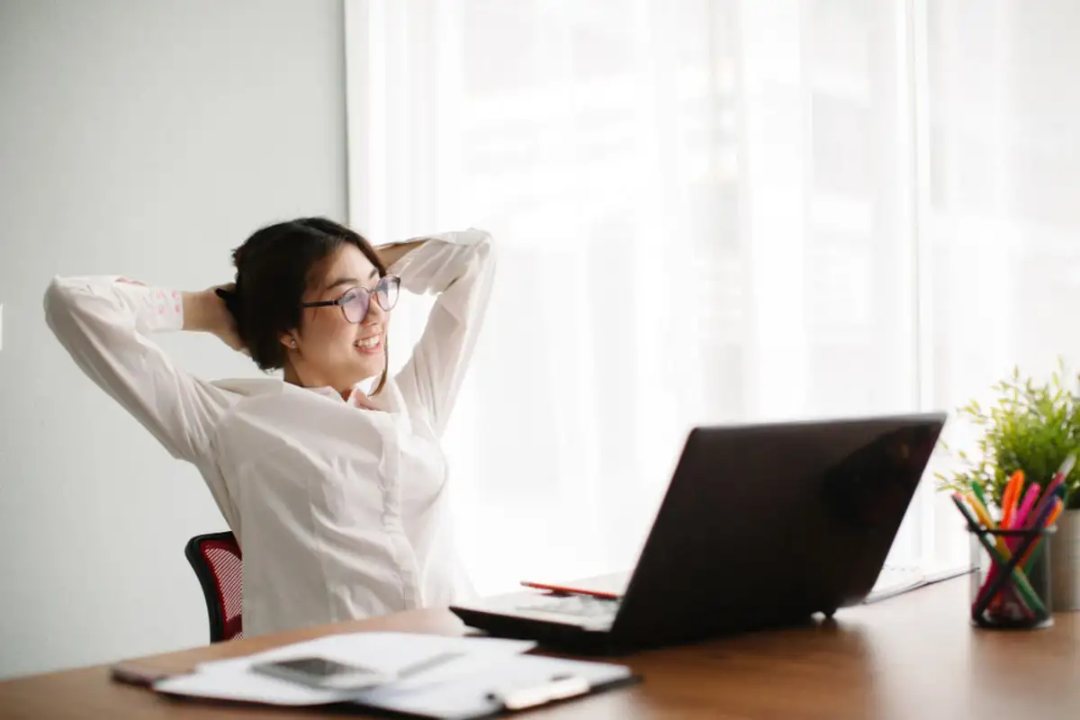 Woman stretching at work