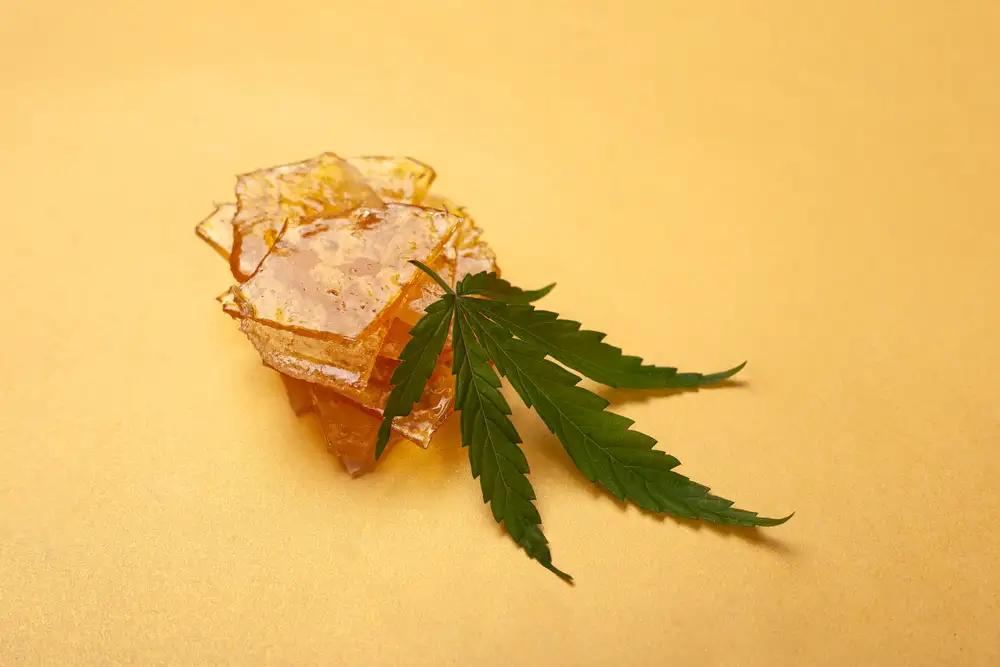 Cannabis leaf with cannabis wax