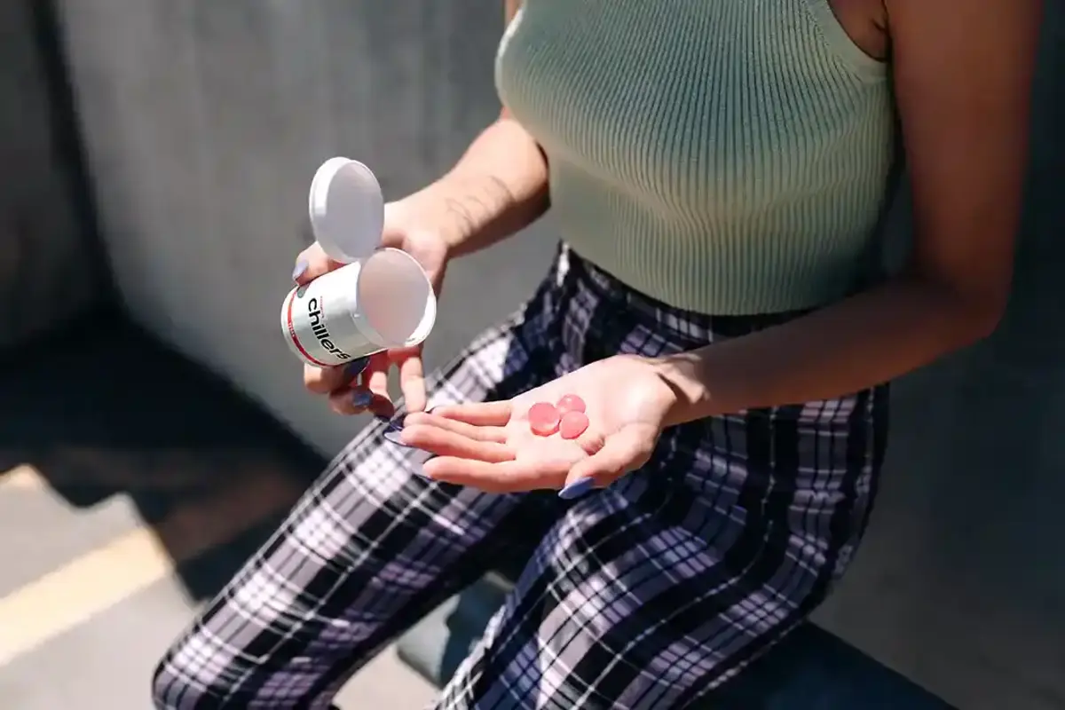 Woman holding a medical marijuana edibles