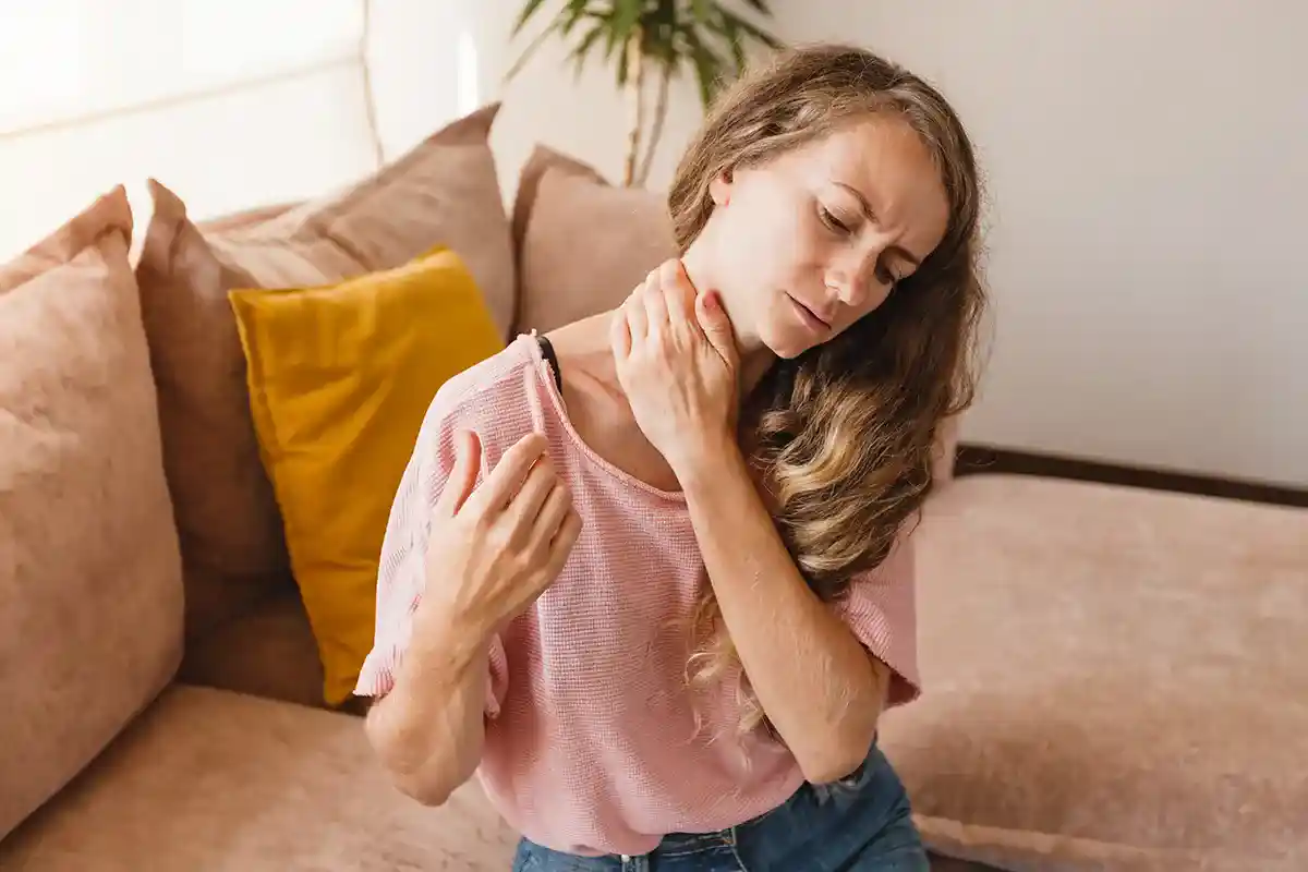 Woman rubbing her neck