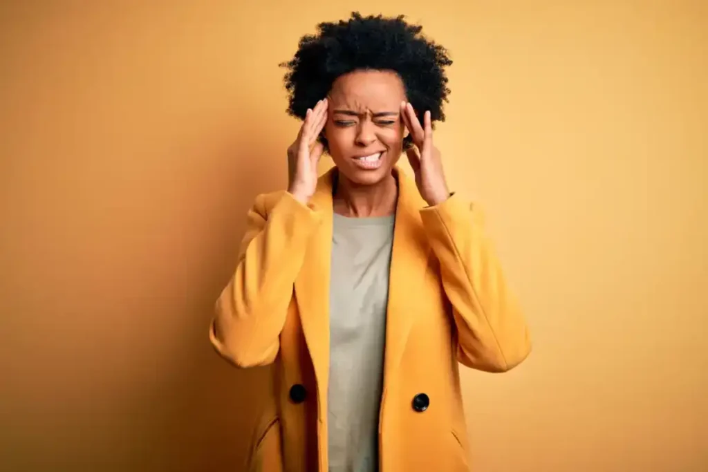 Black woman with a painful headache