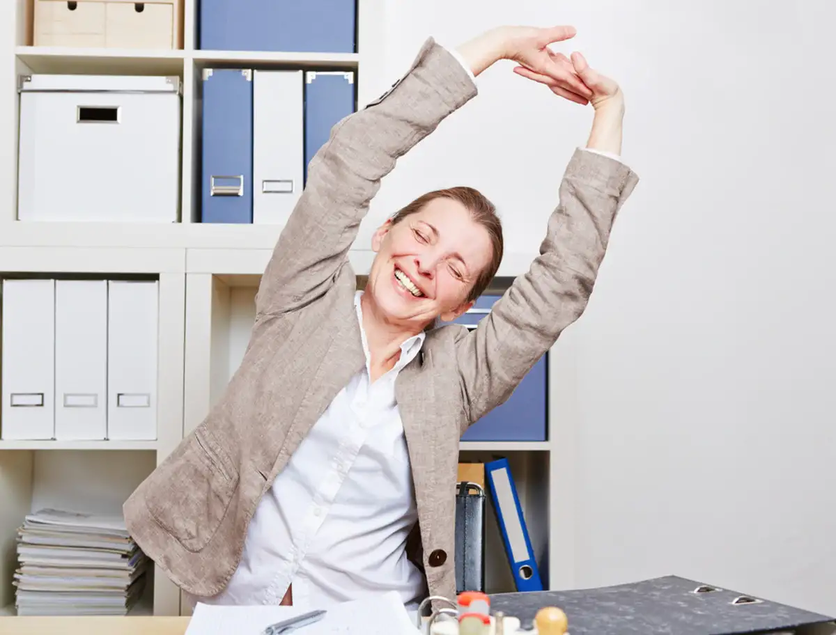 female worker stretching